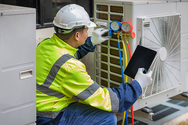 Professional Hvac technician working in Kent City, MI